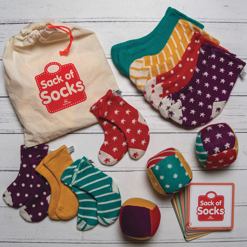 Sack Of Socks And Patterned Dice Set