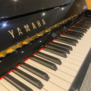 Pre-owned Yamaha C110A upright piano in polished ebony