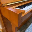 Pre-owned Yamaha E110N upright piano in cherry satin