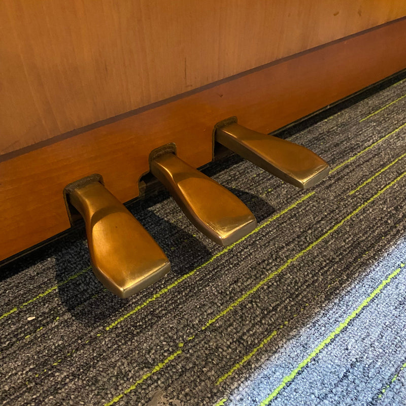 Pre-owned Yamaha E110N upright piano in cherry satin