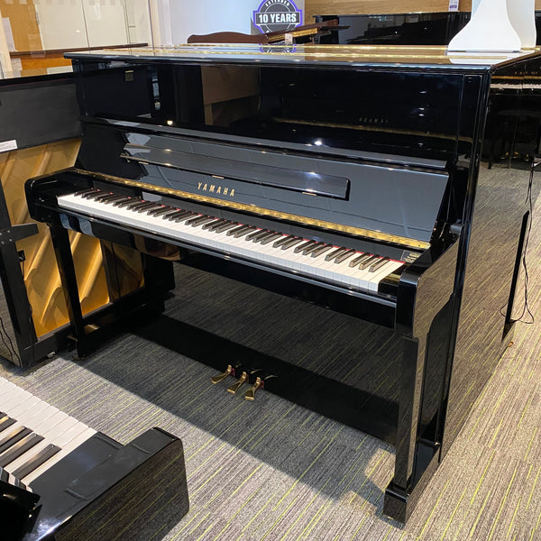 Pre-owned Yamaha P121 upright piano in polished ebony