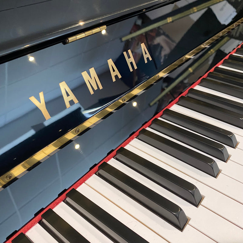 Pre-owned Yamaha P121 upright piano in polished ebony