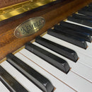 Pre-owned Kemble Studio upright piano in satin mahogany