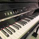 Pre-owned Yamaha P116 upright piano in polished ebony, chrome fittings