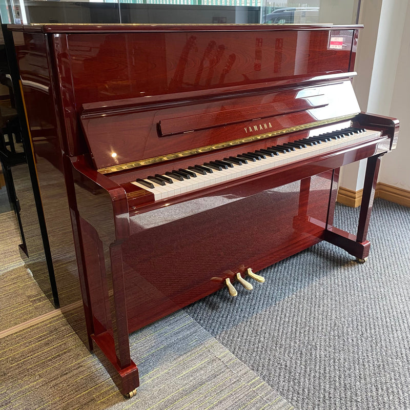 Pre-owned Yamaha P121G upright piano in polished mahogany