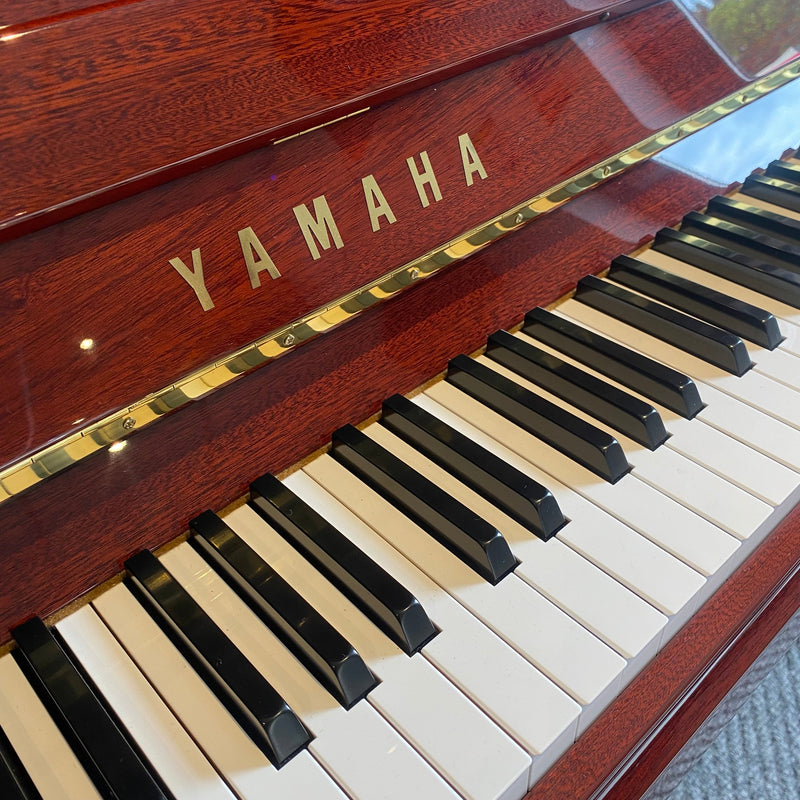 Pre-owned Yamaha P121G upright piano in polished mahogany