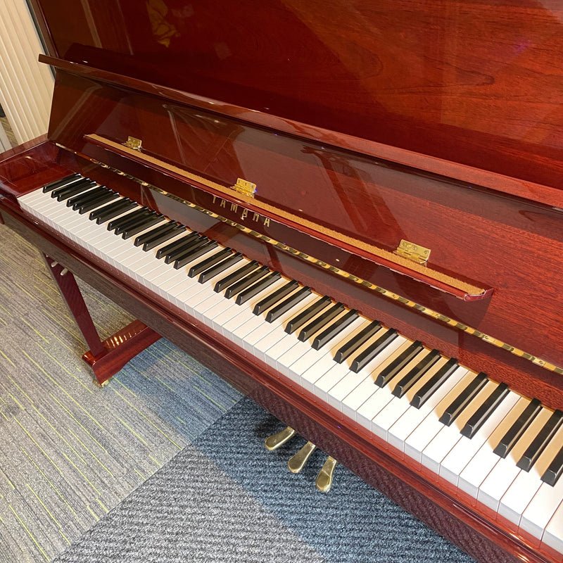 Pre-owned Yamaha P121G upright piano in polished mahogany