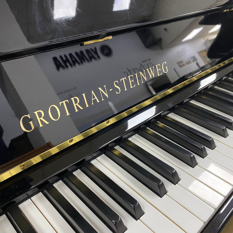 Pre-owned Grotrian Steinweg 116 upright piano in polished ebony