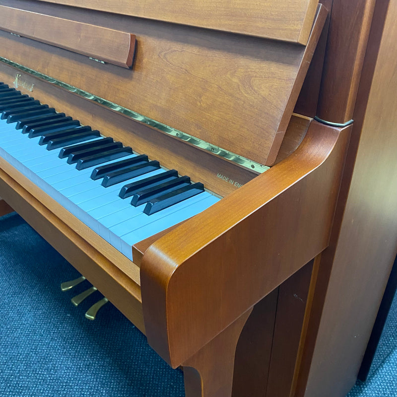 Pre-owned Kemble Prestige upright piano in cherry satin with yew inlay